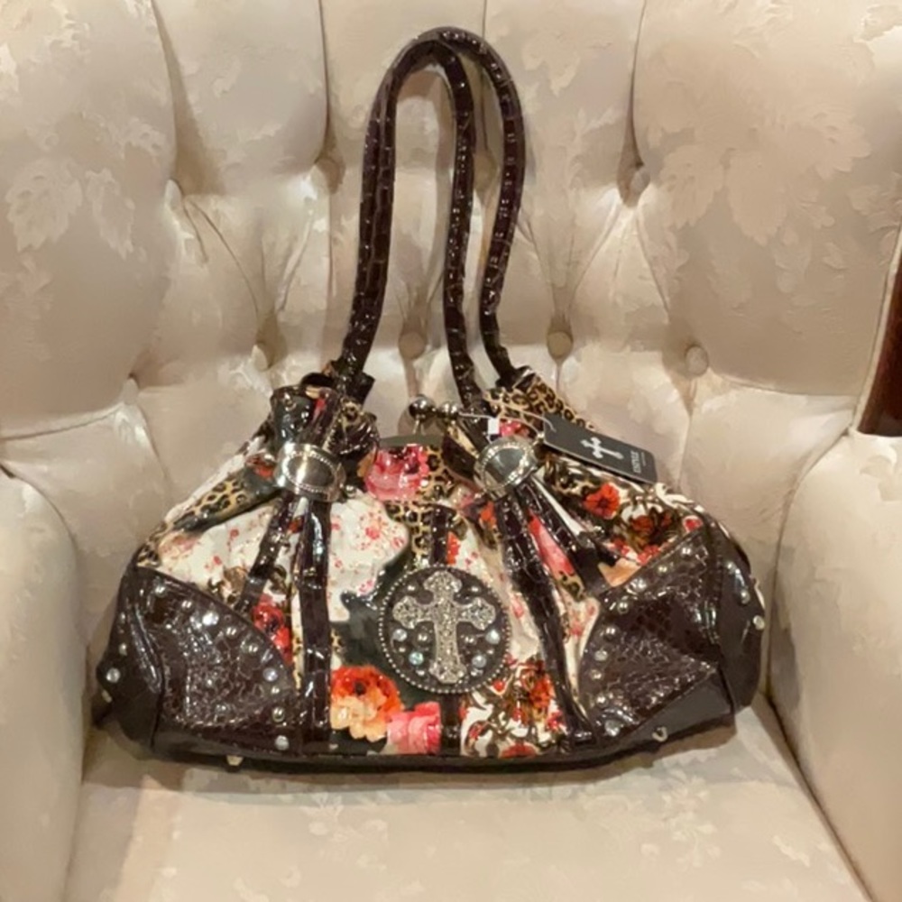 USTYLE floral faux leather bag. Rhinestone Cross detail. Roomy and lightweight.